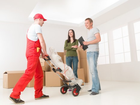Careful handling of sofas and tables during storage preparation