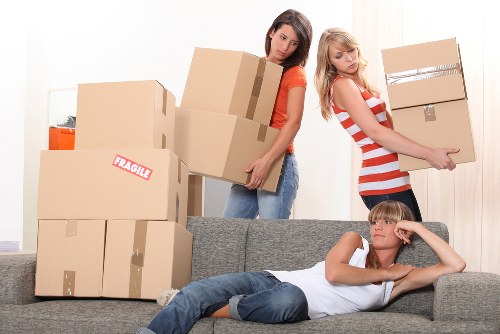 Careful loading of household items for a small removals job