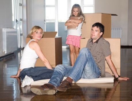 Packed boxes and furniture ready for collection in Islington